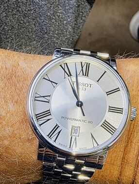 Tissot Silver Watch with Blue Hands and White Dial